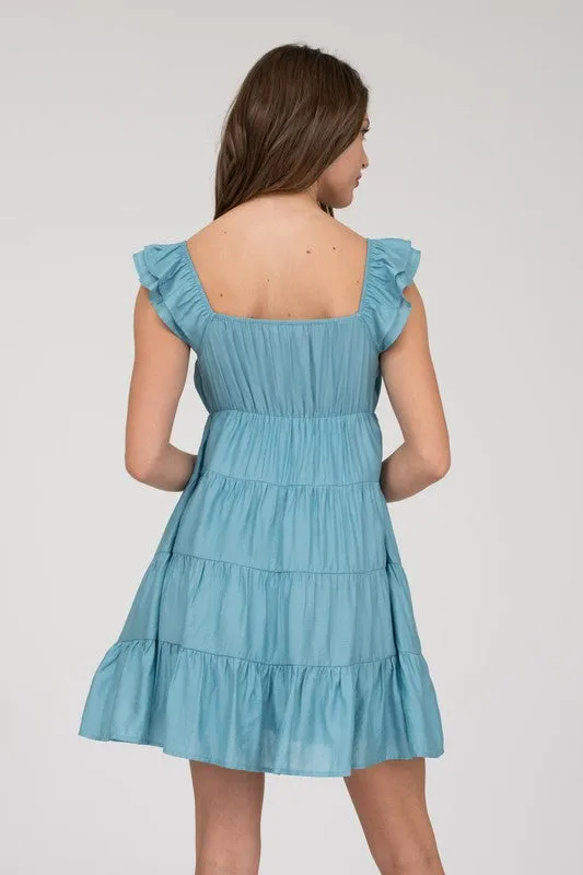 V NECK TIERED BABYDOLL MINI DRESS